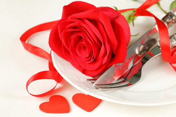 Romantic table setting with roses for the holiday St. Valentine - Photo, Image