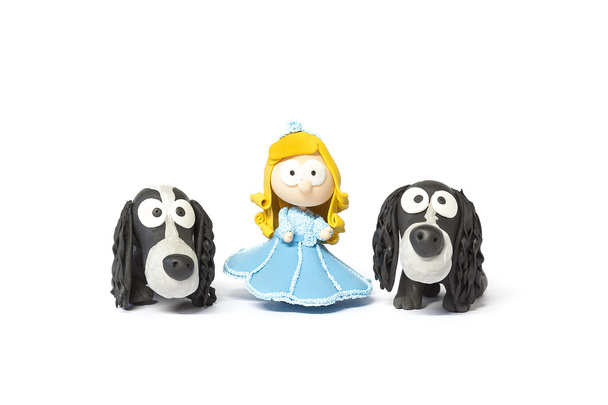 Toy doll with dogs on white - Photo, Image
