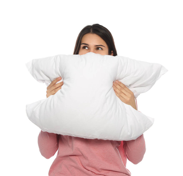 Young woman covering face with pillow on white background - Fotografie, Obrázek