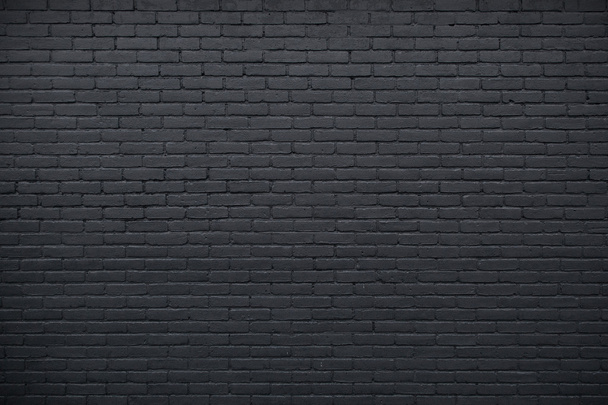 partie du mur de briques peintes en noir
 - Photo, image