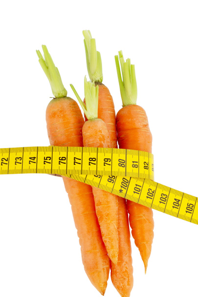fresh carrots with tape measure - Photo, Image