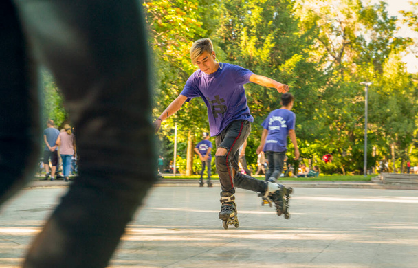 Ankara/Turkey-June 23 2019: Boy rolling around on roller skates. Entertainment and leisure. Sports and Hobbies of teenagers - Φωτογραφία, εικόνα