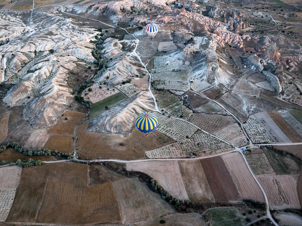 Goreme, Cappadocia, Turkey - June 16, 2014: Cappadocia, Turkey.The greatest tourist attraction of Cappadocia, the flight with the balloon
 - Фото, изображение