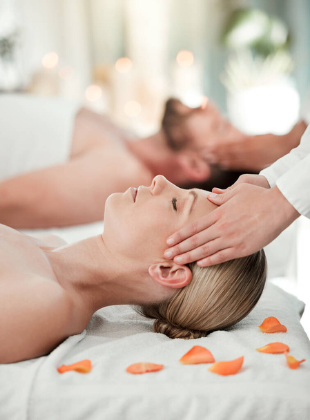 Couple, head massage or relax wellness in hotel, hospitality salon or zen spa in stress release, relax or self care. Reiki hands, man or woman on table bed for peace, headache relief or healthy sleep. - Foto, Bild