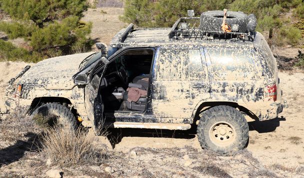 Off-road vehicle in muddy terrain.   - Photo, Image