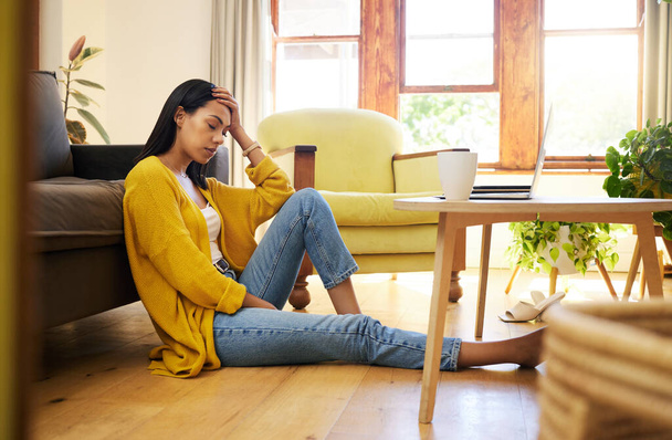Stress, depression or burnout woman with laptop on living room floor for home finance, studying or house rent debt. Sad, anxiety and burnout student with mental health problem for online fail mistake. - Photo, image