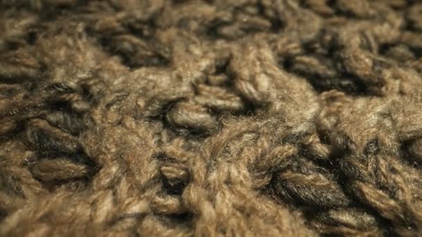 Textura de tejido de lana caliente de punto. Primer plano. - Metraje, vídeo