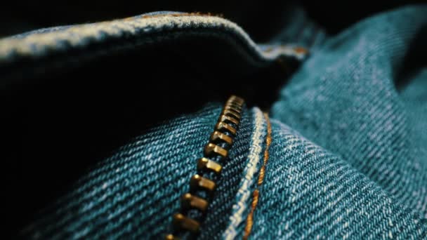 Denim blue jeans fabric texture. Close-up. - Footage, Video