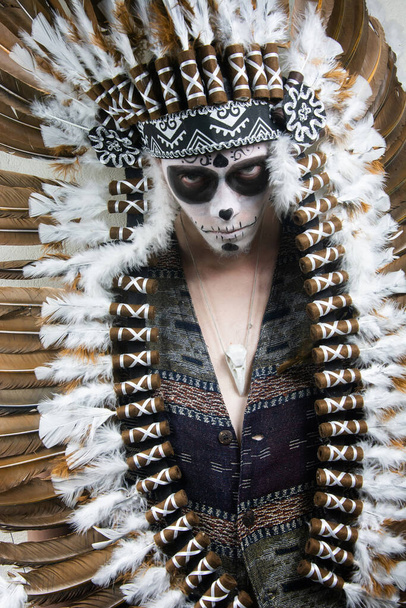 man with skull and skeleton in halloween costume - Photo, Image