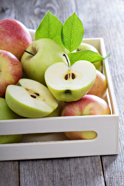 Fresh apples in a wooden box - Fotó, kép