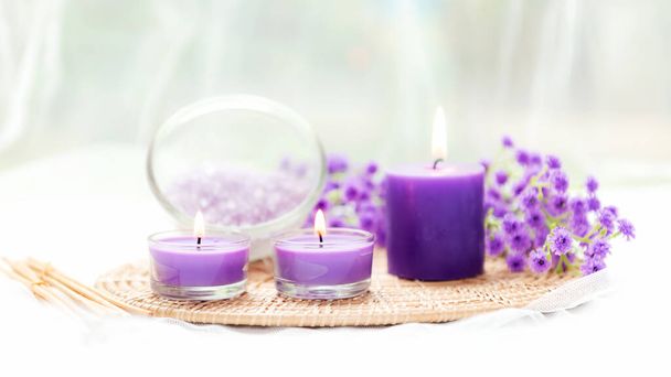 Spa beauty massage health wellness background. Spa Thai therapy treatment aromatherapy for body woman with purpule flower nature candle for relax and summer time - Fotografie, Obrázek