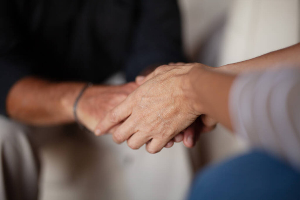Cancer diagnosis. Hands holding other hands. Consultation with a psychologist. Hope and kindness. - Photo, Image