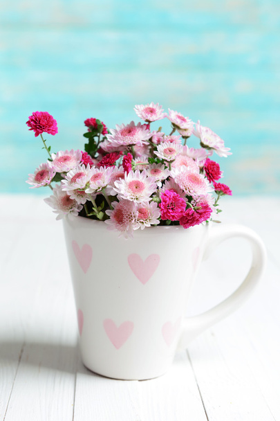 Beautiful flowers in cup - Foto, immagini