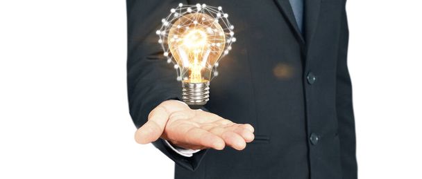 Humans hold light bulbs in hand innovative technology and creativity - Foto, Imagen
