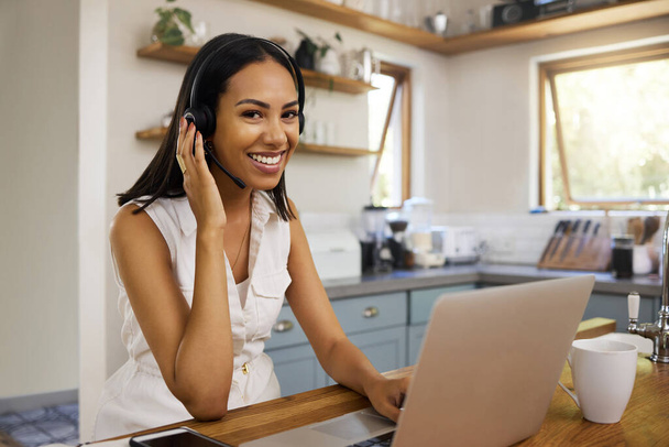 Work from home, laptop and telemarketing woman in portrait for crm customer service, virtual online support or digital manager. Call center consultant, agent or business remote worker in her kitchen. - Foto, Bild