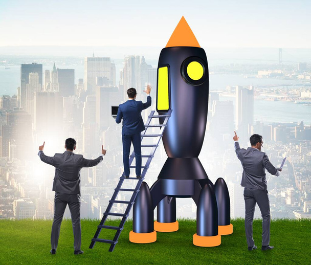 The young businessman boarding space rocket in start-up concept - Foto, afbeelding