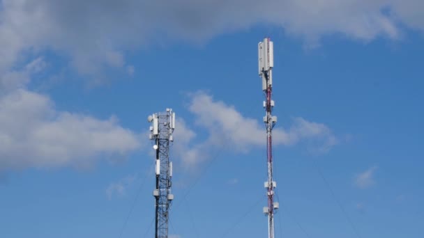 Cell tower on the background of Blue sky and white clouds. Cellular Tower. Cumulus cloud cloudscape timelapse. Summer blue sky time lapse. Nature blue sky. White clouds background. Cloud time lapse - Footage, Video
