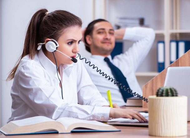 The call center operators working in the office - Photo, Image