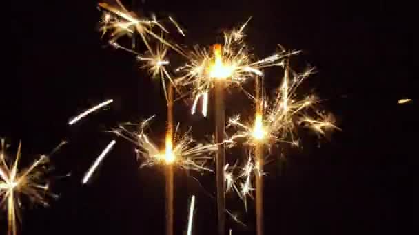 burning Christmas sparklers and sparks 4k - Metraje, vídeo