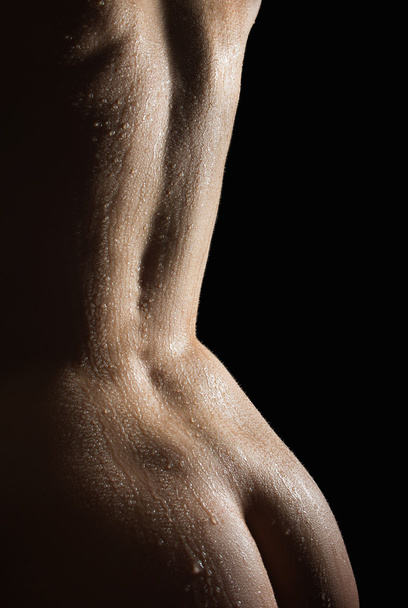 Beautiful back of a nude woman with wet body - Фото, зображення