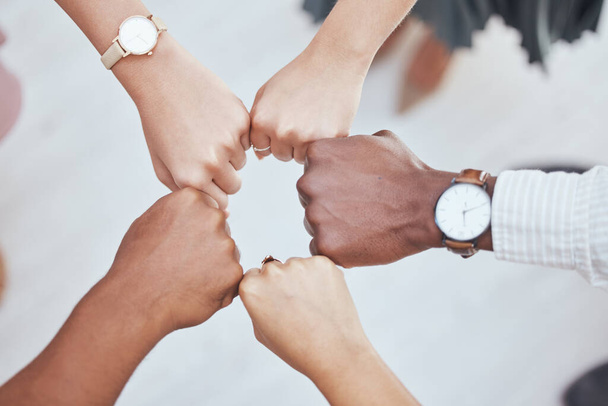 Fist in circle, corporate team building and diversity in business employee teamwork for support or group motivation. Company staff, hands together and show people solidarity or collaboration at work. - Φωτογραφία, εικόνα