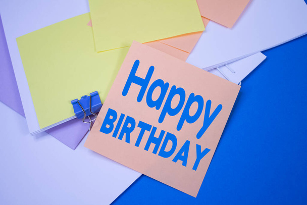 Happy Birthday. Text on adhesive note paper. Event, celebration reminder message. - Photo, Image
