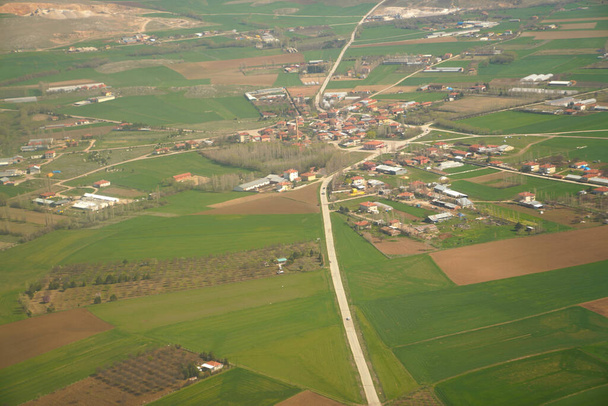 Aerial view of houses among fields in countryside in Turkey - Фото, зображення