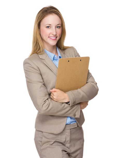 Businesswoman with clipboard - Фото, изображение