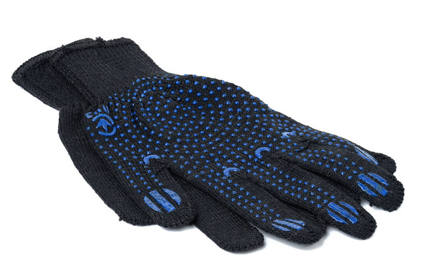 Textile black work gloves on a white background. Protective clothing for manual workers - Photo, Image