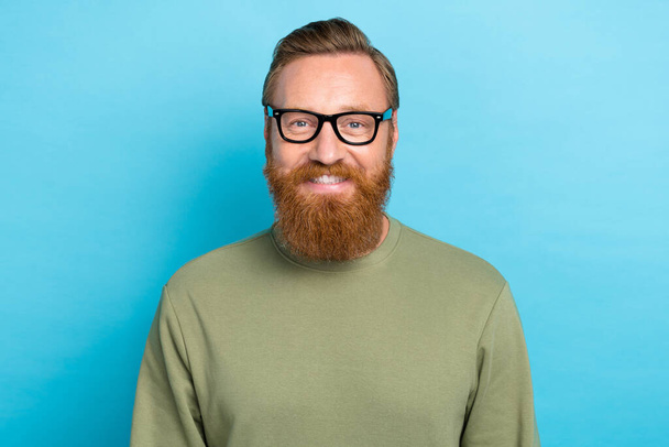 Photo portrait of handsome young guy toothy smile spectacles entrepreneur wear khaki garment isolated on cyan color background. - Photo, Image