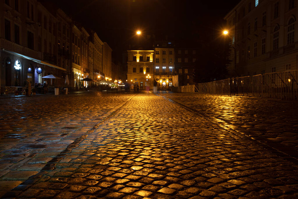 Lviv, Ukraine - October 12, 2022: Lviv city cente at night - Foto, Bild
