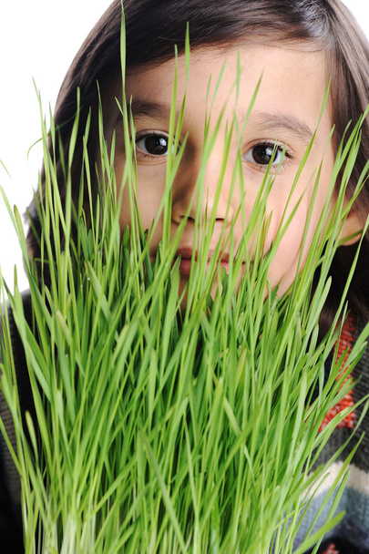 Kid with grass - Foto, immagini