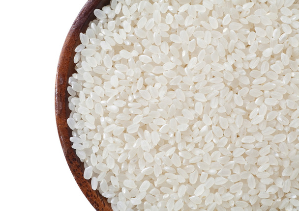 Белая сухая сырая куча риса в миске
 - Фото, изображение