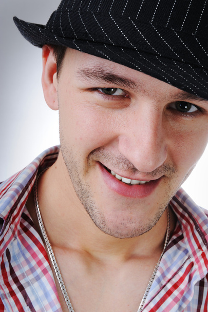 Studio picture of a young man smiling - Foto, Imagem