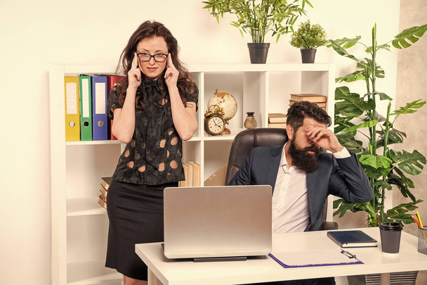 Get back to work. Man and woman work in office. Boss and secretary at workplace. Businessman and businesswoman working on project. Professional couple. - 写真・画像