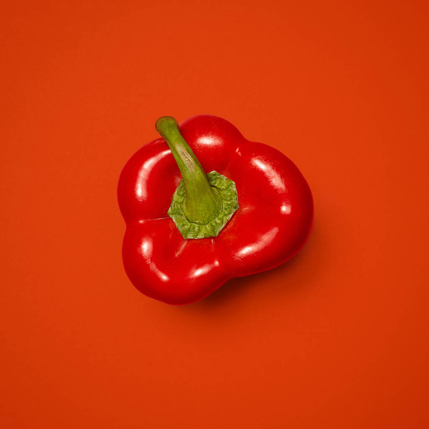 Sweeter than your average pepper. a red pepper against a studio background - Fotoğraf, Görsel