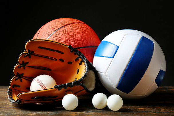 Sports balls on black - Фото, зображення