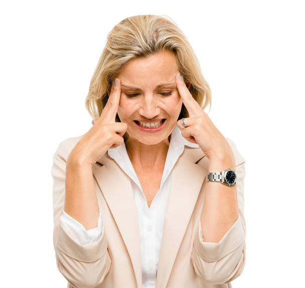 Business is not for the faint of heart. a mature woman experiencing a headache against a studio background - Photo, Image