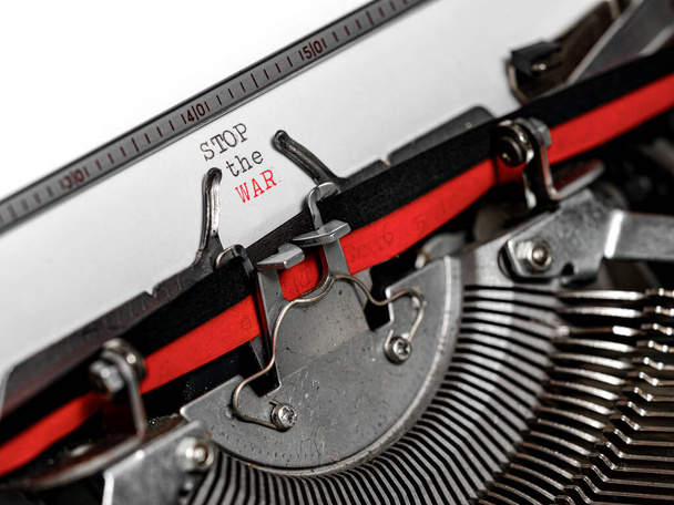 Stop the war in Ukraine. Typed on a vintage typewriter. Red and Black colors. - 写真・画像