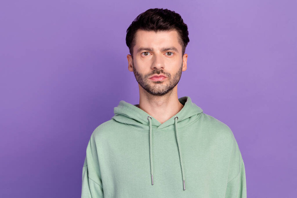 Closeup photo of young funny serious businessman bearded bristle wear khaki hoodie stylish programmer look you isolated on violet color background. - Foto, Bild