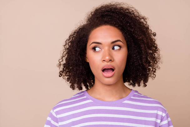 Closeup photo of young attractive pretty woman look empty space open mouth shocked about new summer sale isolated on beige color background. - Fotoğraf, Görsel