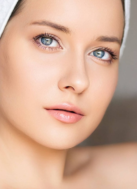 Skin care and beauty routine, beautiful woman with white towel wrapped around head, skincare cosmetics and face cosmetology, close-up portrait - Foto, afbeelding