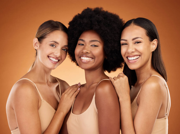 Natural, skincare and portrait of group of women to model beauty, cosmetics and makeup. Beauty products, diversity and multicultural girls with healthy skin, wellness and body care in brown studio. - Zdjęcie, obraz