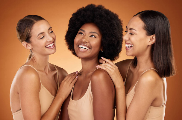 Friends, beauty and women diversity of model group laugh, happy and friendship together. People smile feeling calm, female empowerment and community support experience a laugh in studio background. - Photo, Image