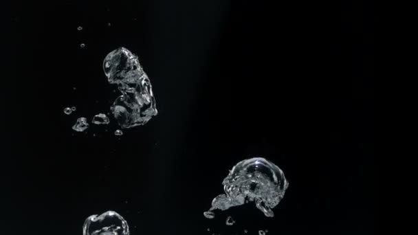 Vízben emelkedő buborékok - Felvétel, videó