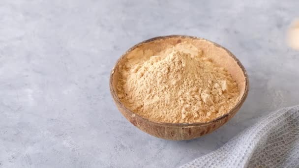 Womans hand taking a spoon of maca root powder. Organic superfood. High quality 4k footage - Footage, Video