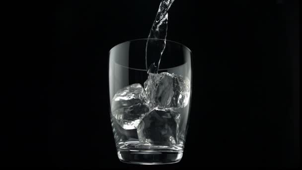 Pouring water into glass - Footage, Video