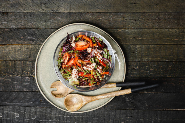 Quinoa salad with chicken and fresh vegetables. - Фото, зображення