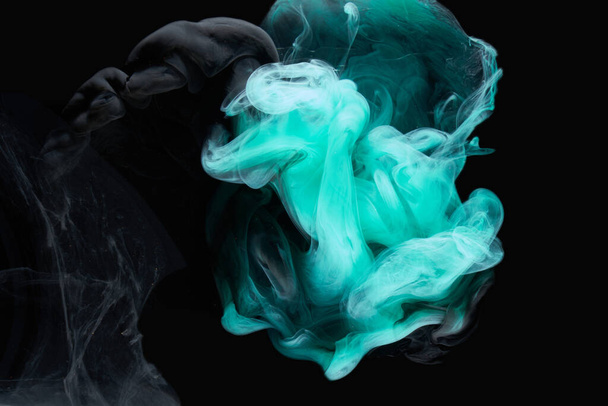 Emerald abstract background, luxury smoke, acrylic paint underwater explosion, cosmic swirling aquamarine ink - Фото, изображение