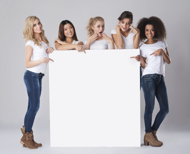Women holding empty white board - Photo, Image